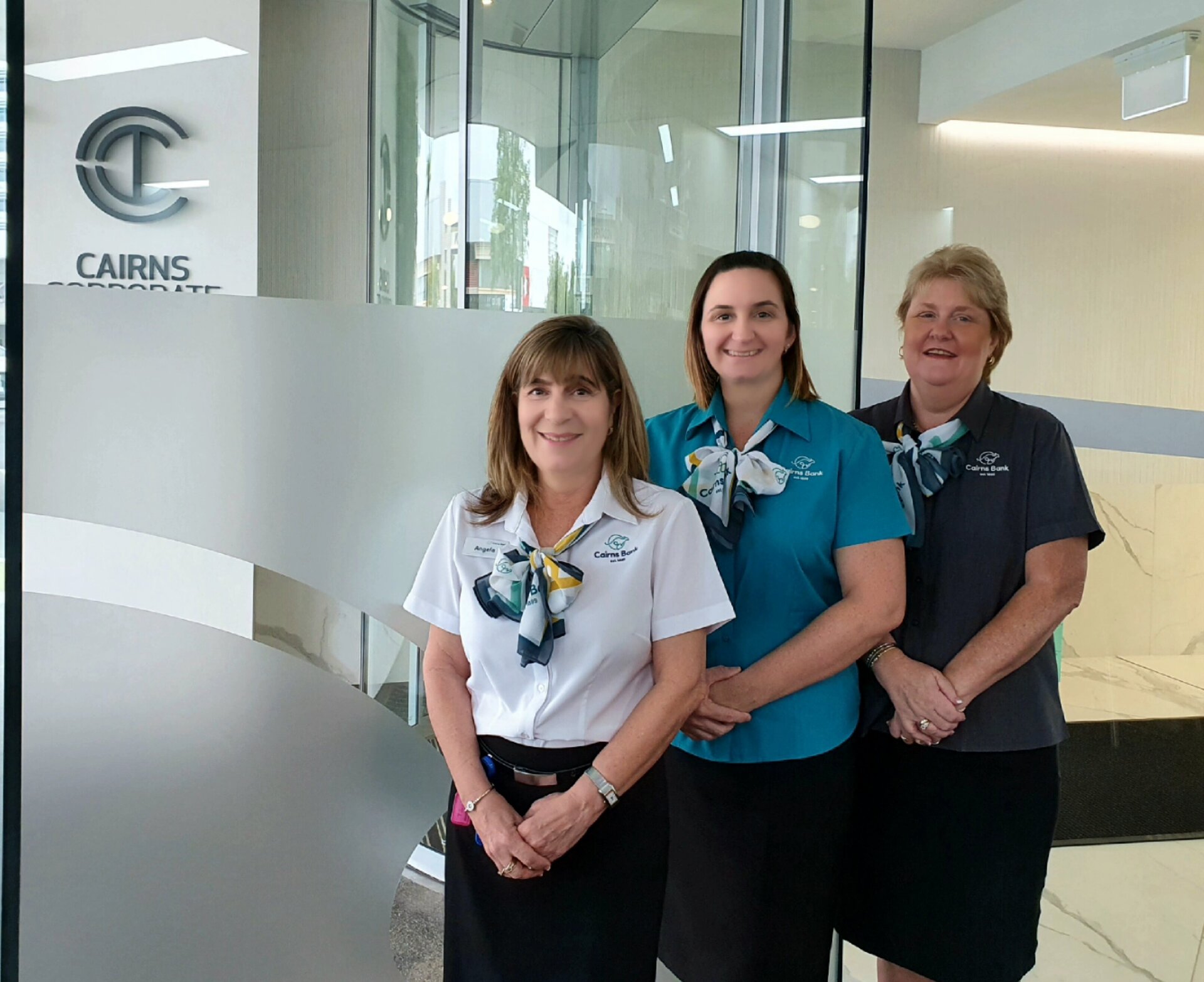 Cairns Bank Team posing in office